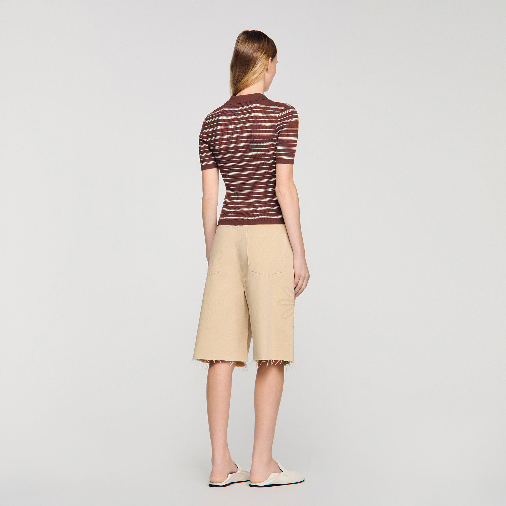 Striped V-neck polo sweater