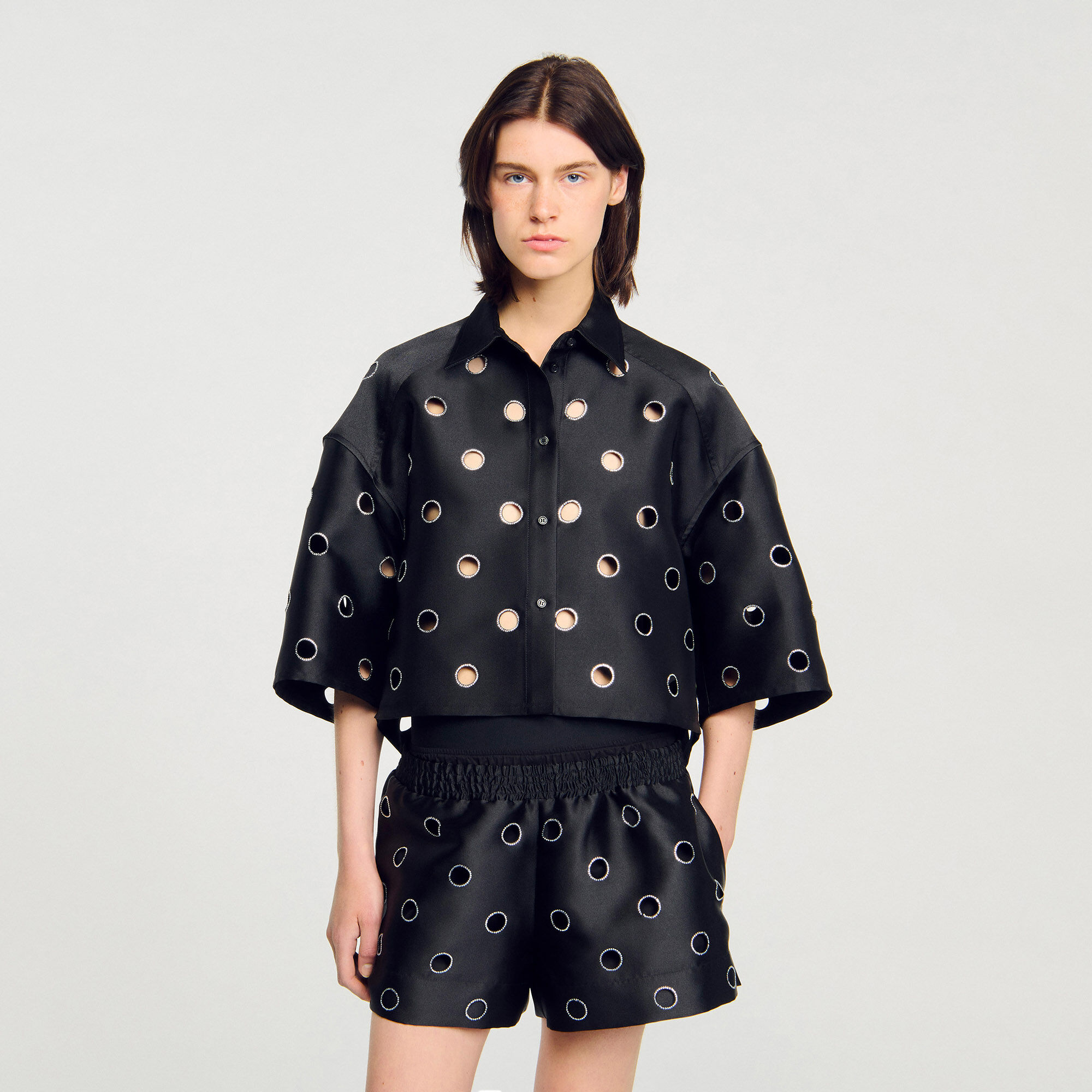 Oversized shirt with rhinestones holes