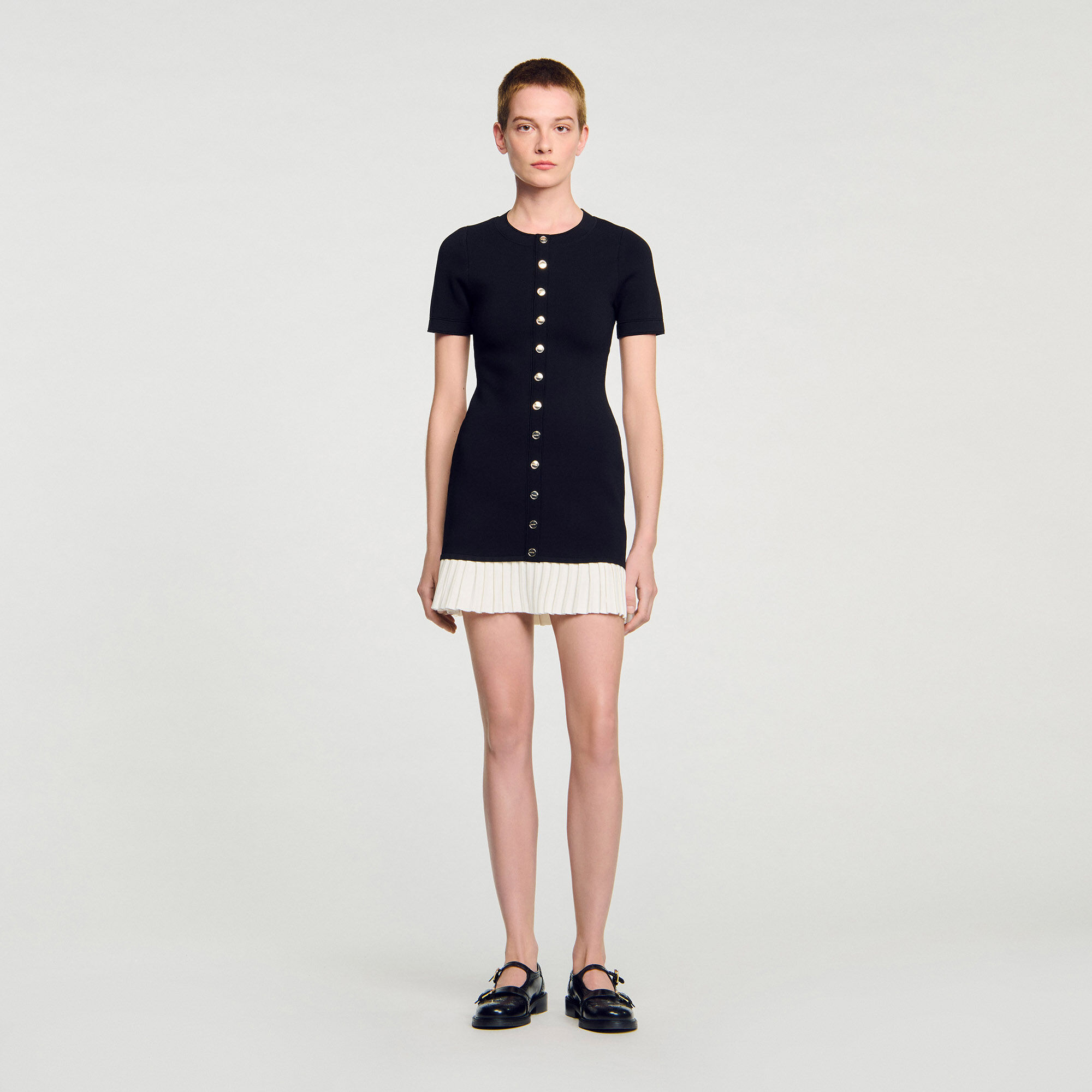Mini knit dress with ruffle