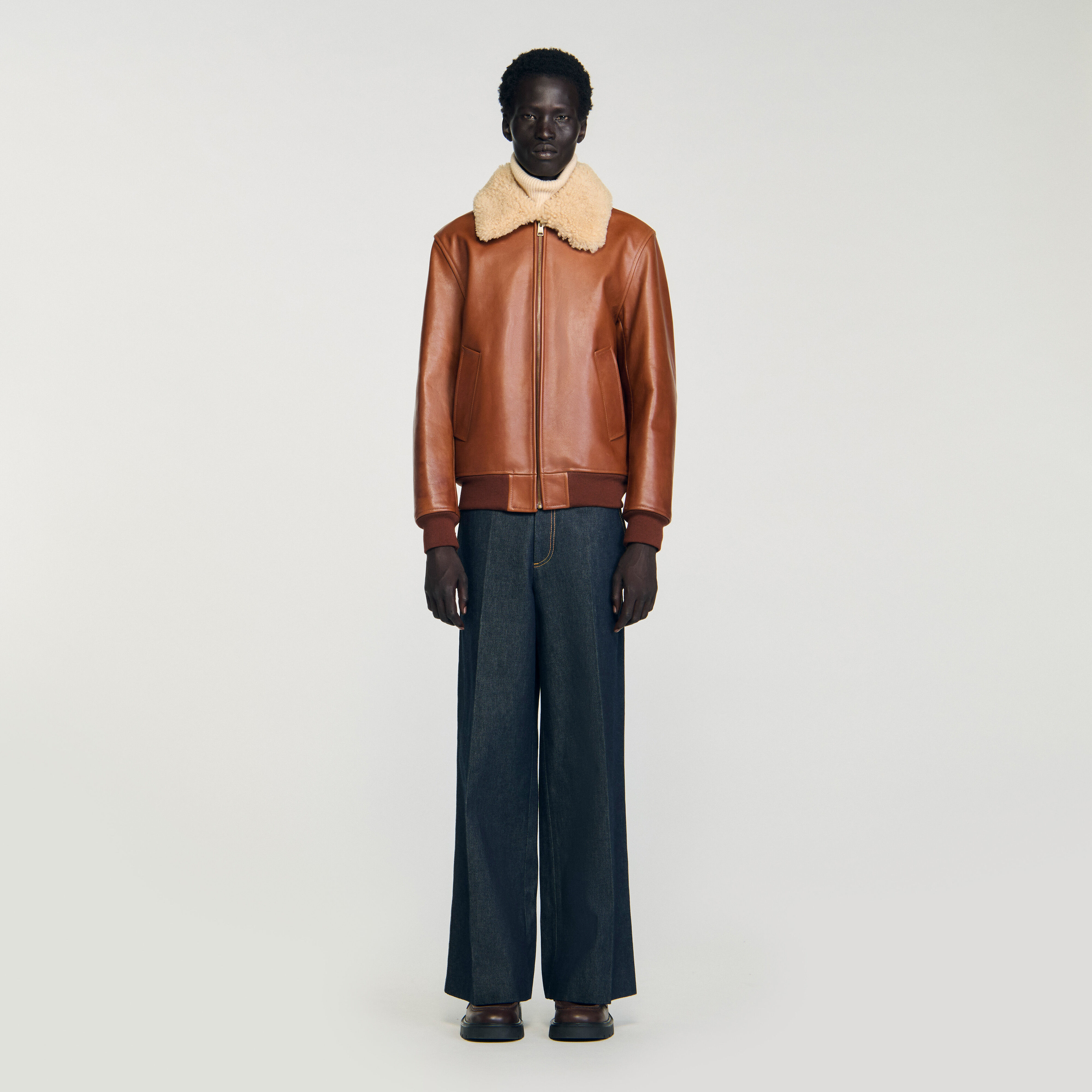 Leather jacket with shearling collar