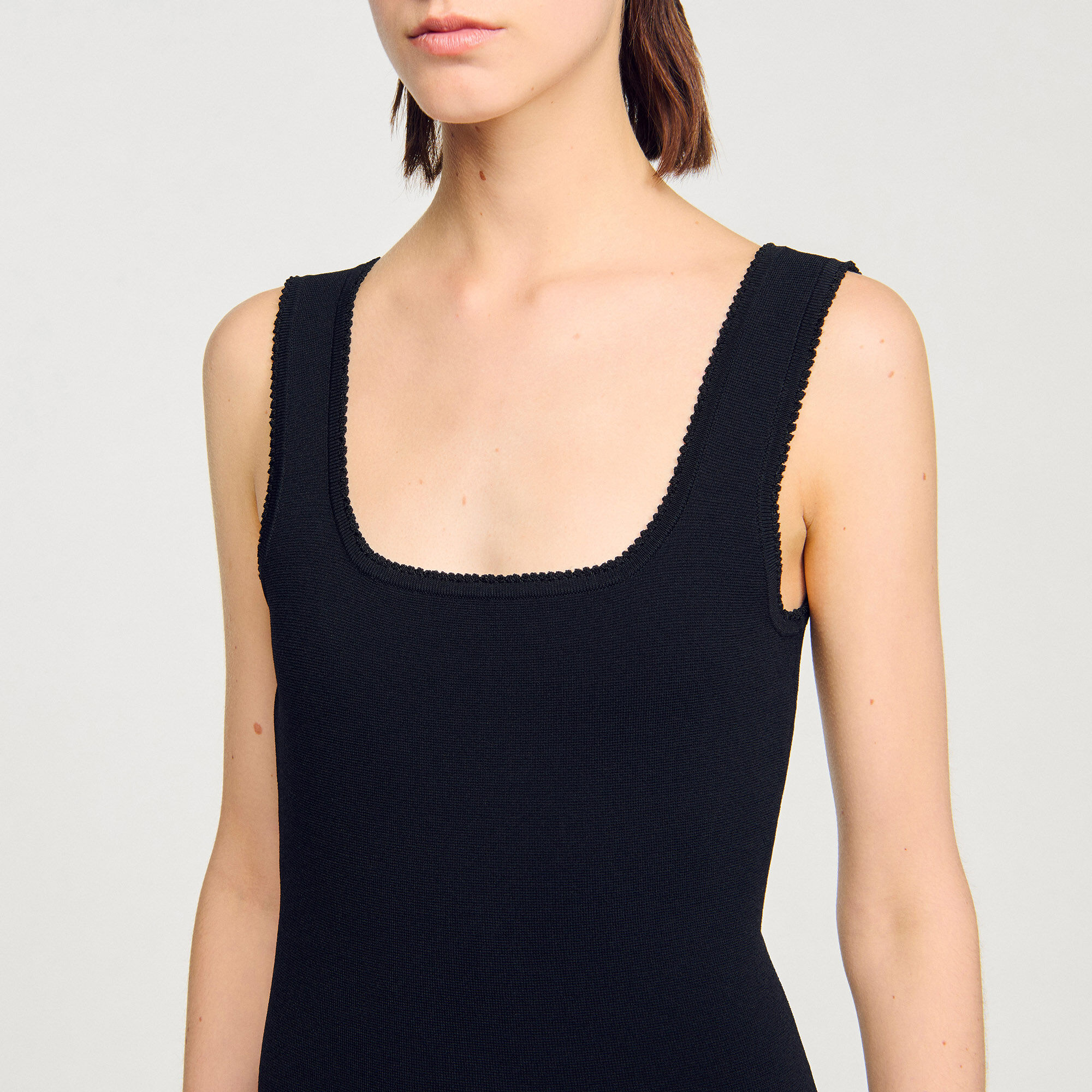 Mini knit dress with ruffles